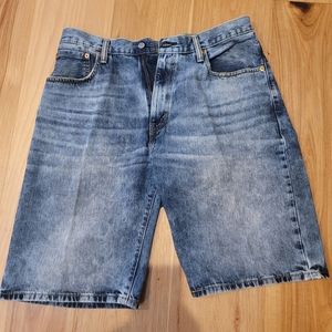 "Gently worn" Levi 569 shorts with a 34 waist and loose fitting.